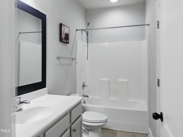 bathroom with toilet, vanity, and bathtub / shower combination