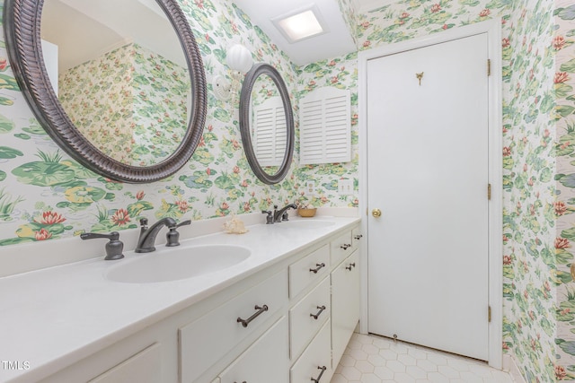 4030 King Charles Rd, Durham, NC 27707 - bathroom featuring wallpapered walls, double vanity, and tile patterned floors