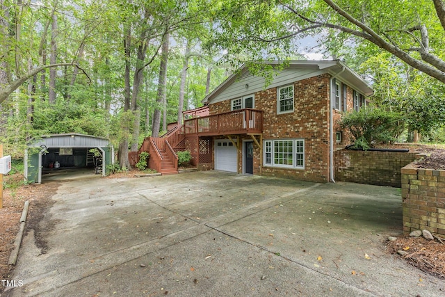 4030 King Charles Rd, Durham, NC 27707 - view of front of house featuring an attached garage, stairway, concrete driveway, brick siding, and a detached carport
