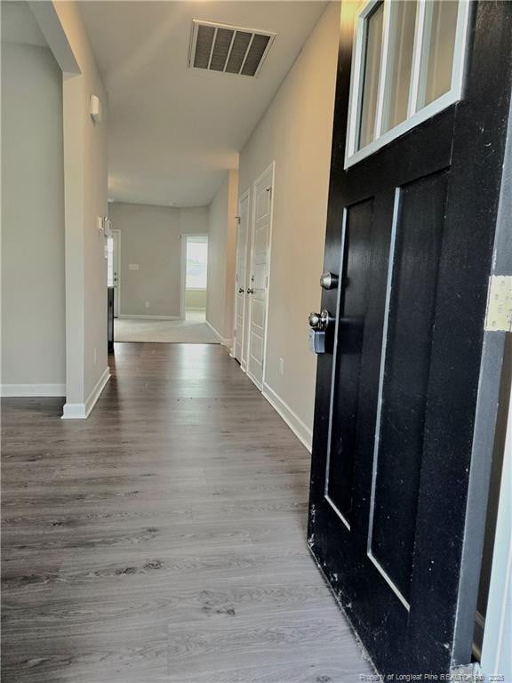 338 E David Parnell St, Parkton, NC 28371 - entryway featuring wood finished floors and baseboards
