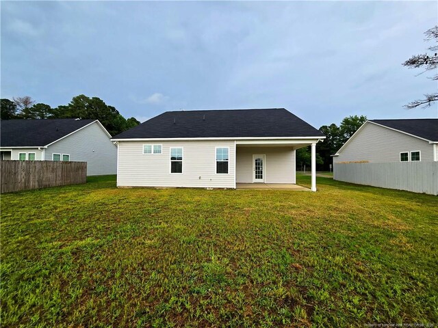 338 E David Parnell St, Parkton, NC 28371 - back of property with a patio area