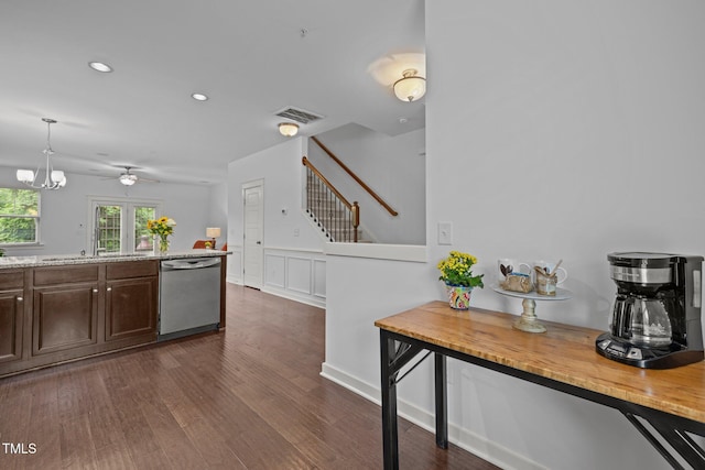 kitchen featuring stainless steel dishwasher, dark wood-style floors, recessed lighting, a sink, and dark brown cabinetry