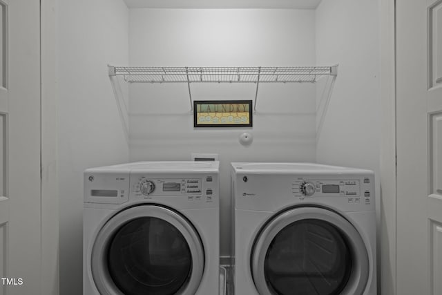 laundry area featuring separate washer and dryer