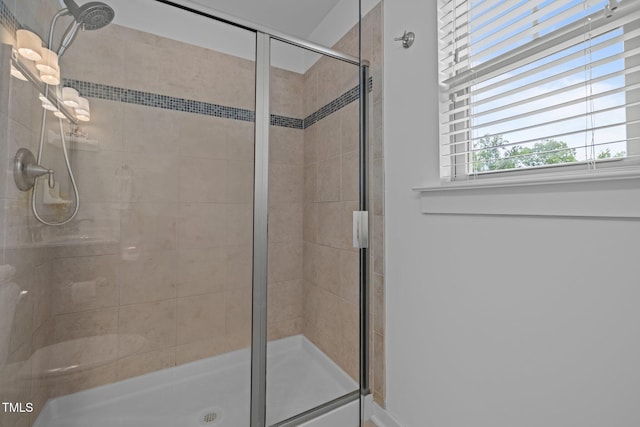 bathroom with a stall shower
