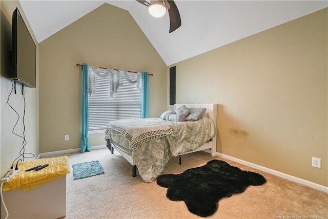 carpeted bedroom featuring vaulted ceiling, baseboards, and ceiling fan