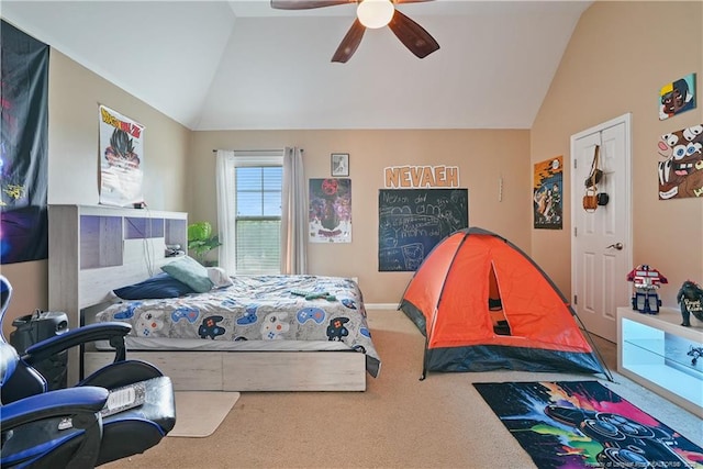 carpeted bedroom featuring vaulted ceiling and ceiling fan