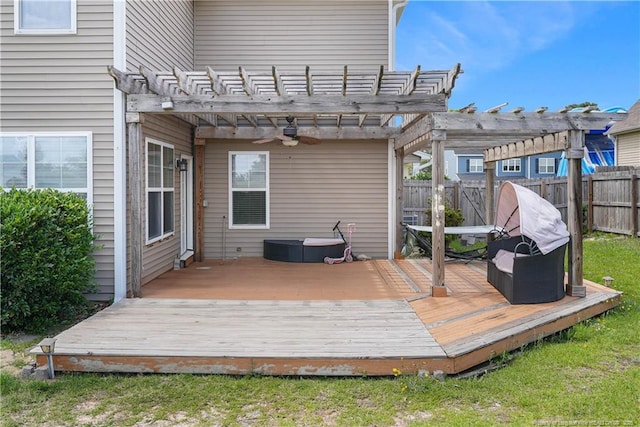 wooden deck with fence, a pergola, and ceiling fan
