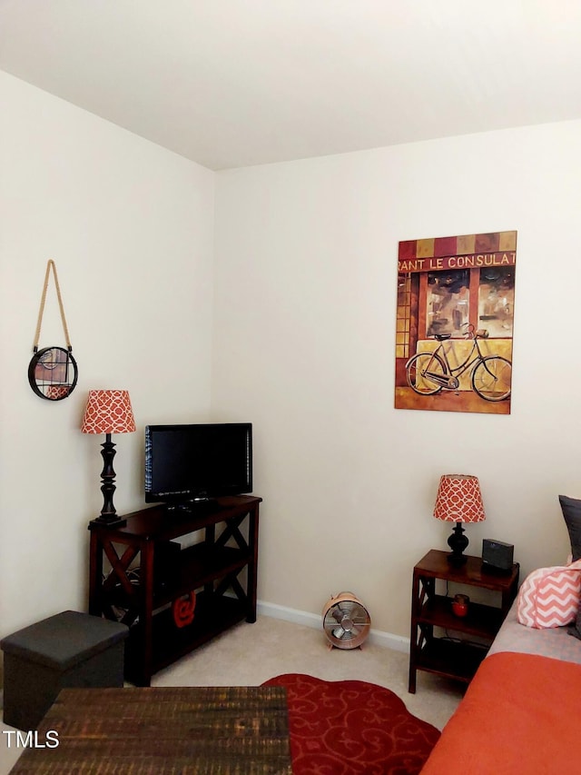carpeted bedroom with baseboards