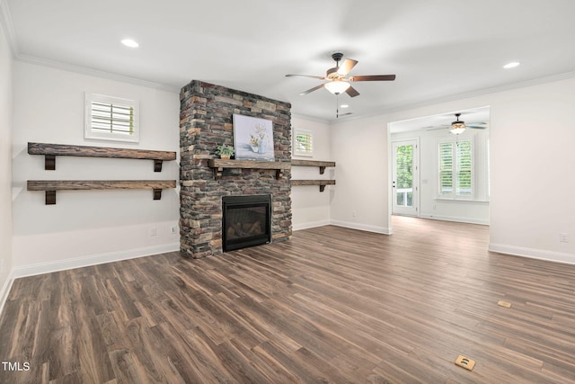 unfurnished living room with ceiling fan, ornamental molding, plenty of natural light, baseboards, and recessed lighting