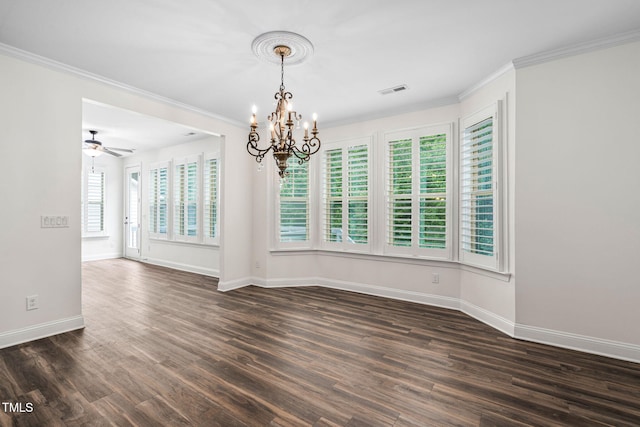 spare room with a chandelier, dark wood-style floors, baseboards, ornamental molding, and ceiling fan