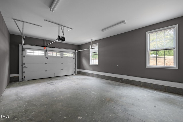 249 Fisherman Point Rd, Roxboro, NC 27574 - garage featuring a garage door opener