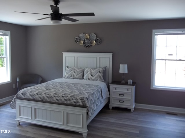 249 Fisherman Point Rd, Roxboro, NC 27574 - bedroom with wood finished floors, baseboards, and a ceiling fan