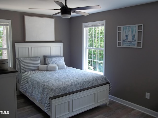 249 Fisherman Point Rd, Roxboro, NC 27574 - bedroom with dark wood-style floors, baseboards, and ceiling fan