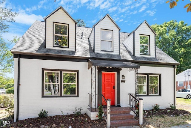 134 Nelson St, Durham, NC 27707 - view of front of home with brick siding and a shingled roof