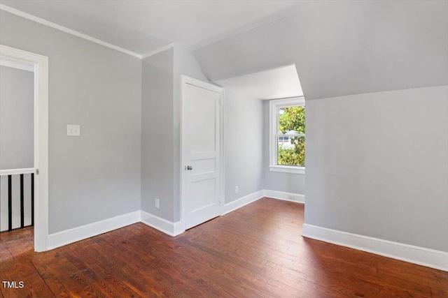 134 Nelson St, Durham, NC 27707 - empty room featuring lofted ceiling, wood finished floors, baseboards, and crown molding