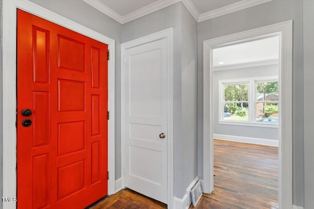 134 Nelson St, Durham, NC 27707 - entryway featuring baseboards, crown molding, and dark wood finished floors