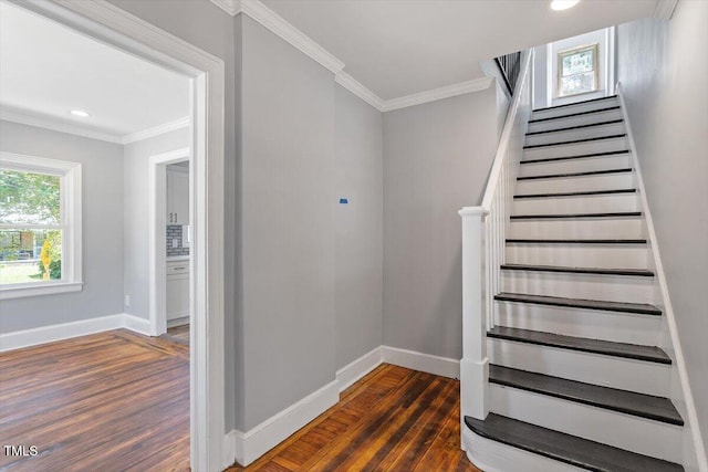 134 Nelson St, Durham, NC 27707 - stairway featuring wood finished floors, baseboards, ornamental molding, and recessed lighting