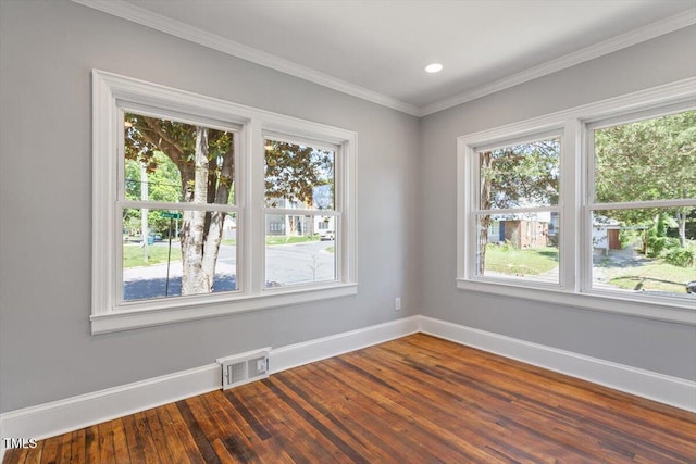 134 Nelson St, Durham, NC 27707 - spare room featuring baseboards, dark wood finished floors, ornamental molding, and recessed lighting