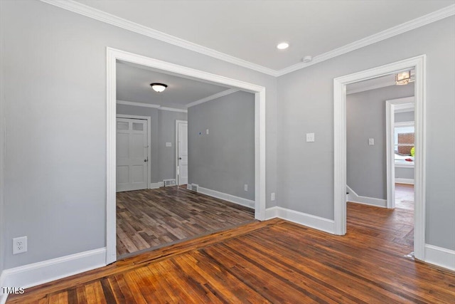 134 Nelson St, Durham, NC 27707 - empty room featuring wood finished floors, baseboards, recessed lighting, ornamental molding, and a smoke detector