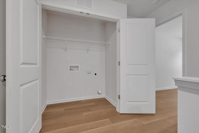 110 Hays St, Oxford, NC 27565 - laundry area with gas dryer hookup, light wood-type flooring, and washer hookup