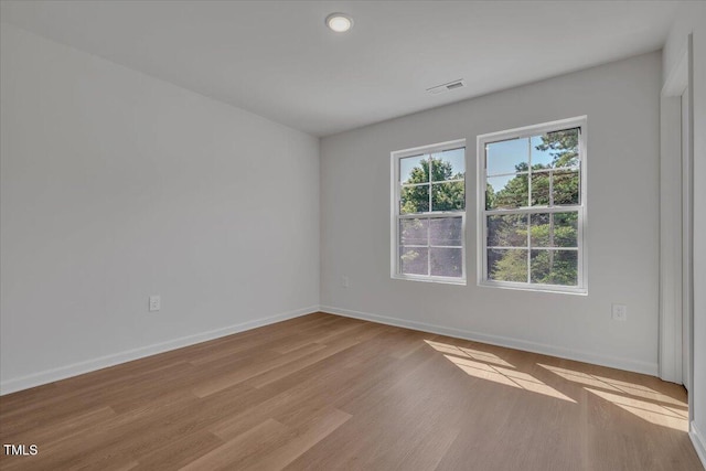 110 Hays St, Oxford, NC 27565 - spare room featuring wood finished floors and recessed lighting