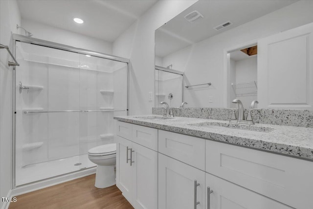 110 Hays St, Oxford, NC 27565 - full bath featuring a stall shower, double vanity, wood finished floors, and recessed lighting