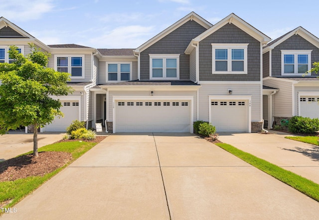 150 Gosford Ln, Garner, NC 27529 - multi unit property with stone siding, an attached garage, and driveway
