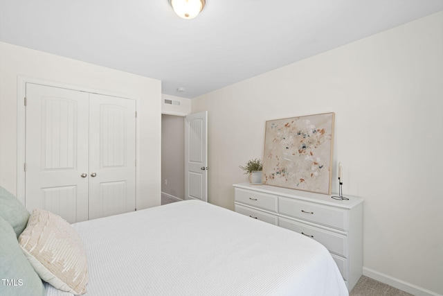 150 Gosford Ln, Garner, NC 27529 - bedroom featuring a closet and carpet flooring