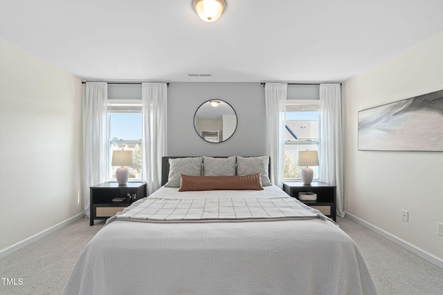 150 Gosford Ln, Garner, NC 27529 - bedroom with light carpet and multiple windows