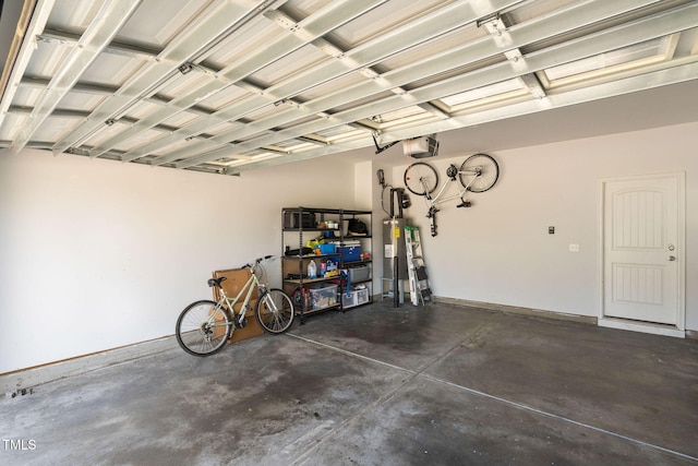 150 Gosford Ln, Garner, NC 27529 - garage featuring a garage door opener and water heater