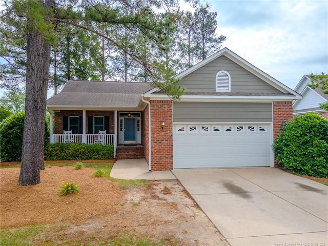 3119 Metthame Dr, Fayetteville, NC 28306 - ranch-style home featuring brick siding, covered porch, concrete driveway, and an attached garage