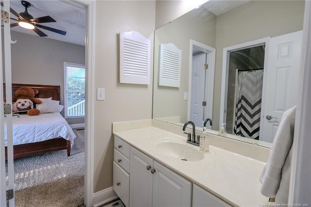 3119 Metthame Dr, Fayetteville, NC 28306 - bathroom with baseboards, ensuite bath, vanity, and a ceiling fan