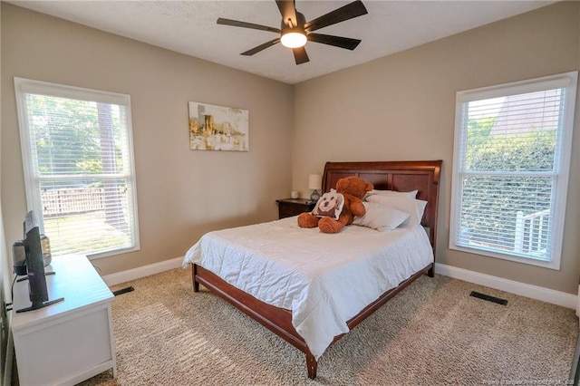 3119 Metthame Dr, Fayetteville, NC 28306 - carpeted bedroom with baseboards and a ceiling fan