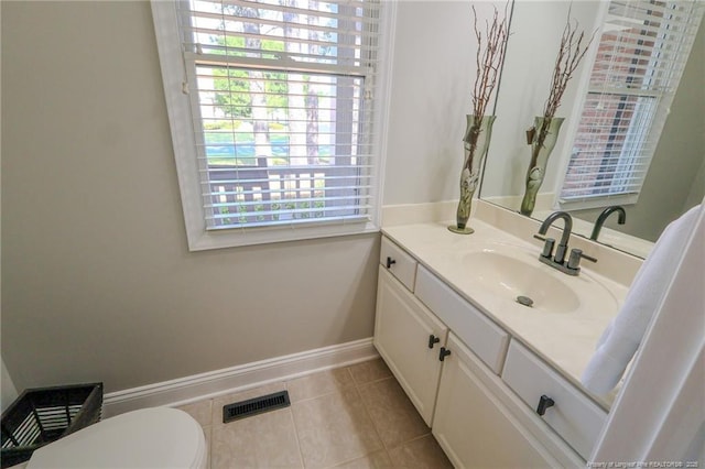 3119 Metthame Dr, Fayetteville, NC 28306 - bathroom featuring tile patterned floors, vanity, baseboards, and toilet