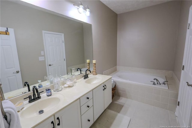 3119 Metthame Dr, Fayetteville, NC 28306 - bathroom with a bath, tile patterned floors, and double vanity