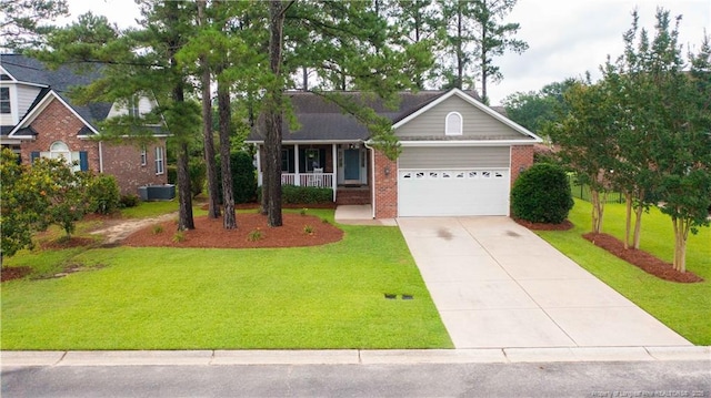 3119 Metthame Dr, Fayetteville, NC 28306 - view of front of property with brick siding, a porch, an attached garage, concrete driveway, and a front yard