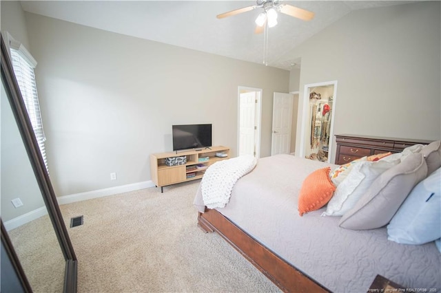 3119 Metthame Dr, Fayetteville, NC 28306 - bedroom featuring a walk in closet, lofted ceiling, light colored carpet, a ceiling fan, and a closet