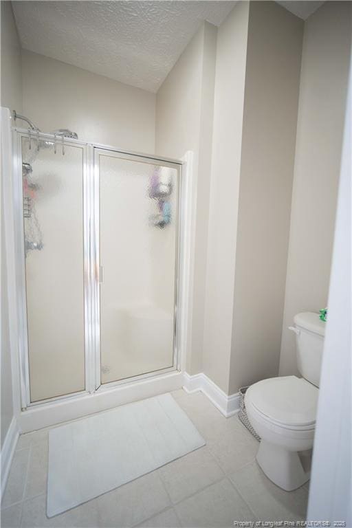 3119 Metthame Dr, Fayetteville, NC 28306 - bathroom with a stall shower and a textured ceiling