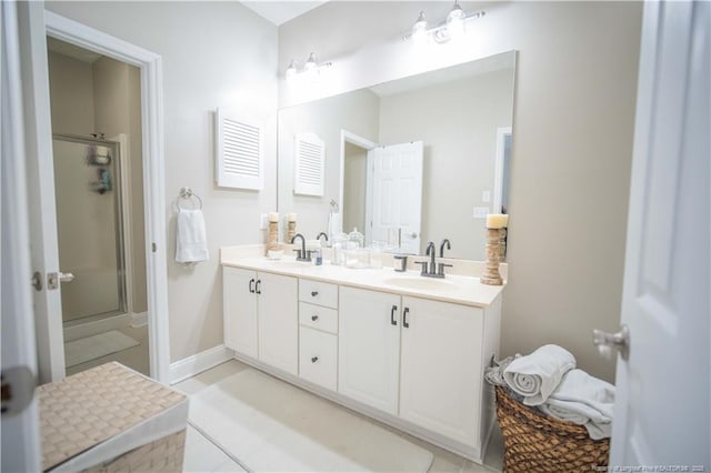 3119 Metthame Dr, Fayetteville, NC 28306 - full bath with double vanity, a shower stall, and tile patterned floors