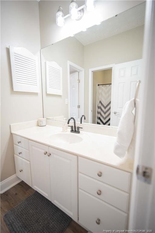 3119 Metthame Dr, Fayetteville, NC 28306 - bathroom featuring vanity and wood finished floors