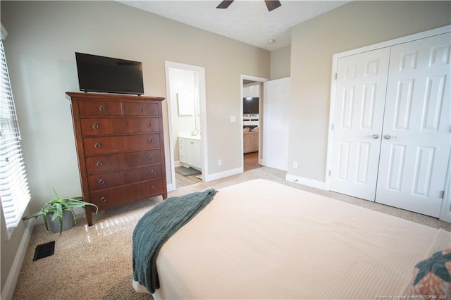 3119 Metthame Dr, Fayetteville, NC 28306 - bedroom with light colored carpet, a closet, ceiling fan, and connected bathroom