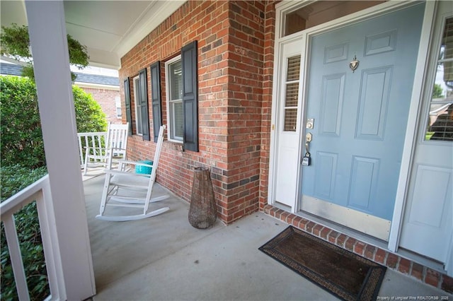 3119 Metthame Dr, Fayetteville, NC 28306 - entrance to property featuring a porch and brick siding