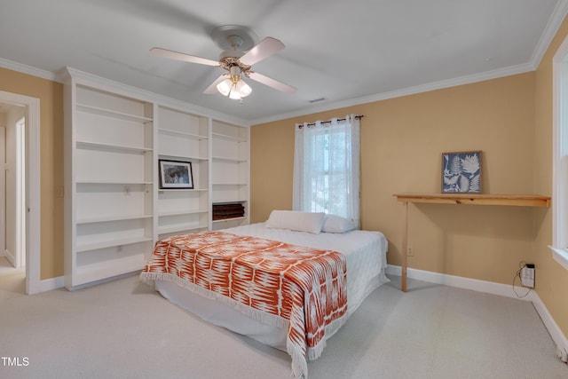 bedroom featuring carpet floors, baseboards, ornamental molding, and ceiling fan