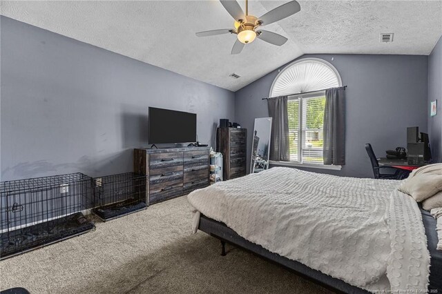 5712 Icarus Cir, Fayetteville, NC 28304 - carpeted bedroom featuring vaulted ceiling, a textured ceiling, and a ceiling fan