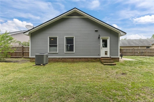 5712 Icarus Cir, Fayetteville, NC 28304 - back of house featuring central AC and entry steps