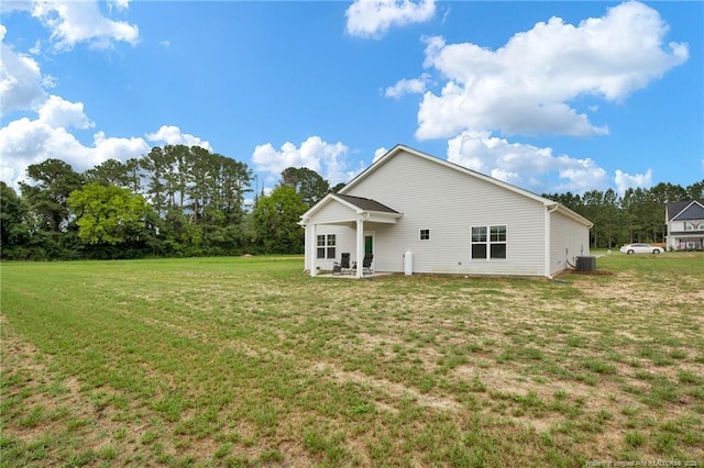 5831 James Allen Ln, Stedman, NC 28391 - back of property with cooling unit, a yard, and a patio area