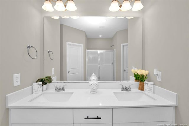 5831 James Allen Ln, Stedman, NC 28391 - full bath featuring a stall shower, double vanity, and a chandelier