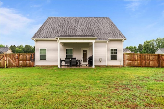 rear view of property featuring a patio