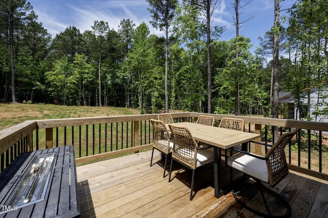 220 Purslane Dr, Franklinton, NC 27525 - deck featuring outdoor dining area and a lawn