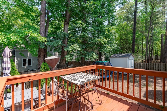 208 Silk Hope Dr, Cary, NC 27519 - wooden deck with a storage shed and a fenced backyard